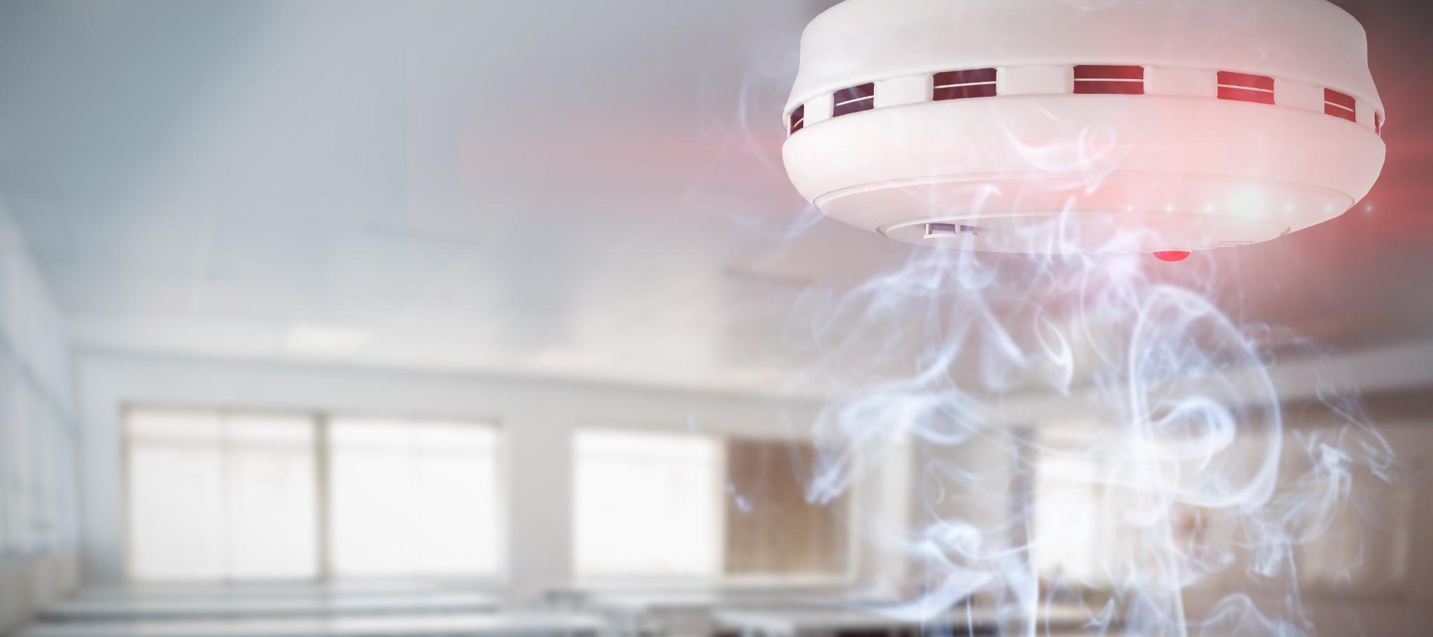 Smoke detector activating during a developing fire